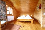 Schlafzimmer Holzhaus Lavendel